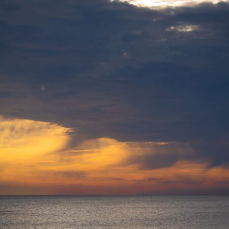 Golden Rays Through the Storm